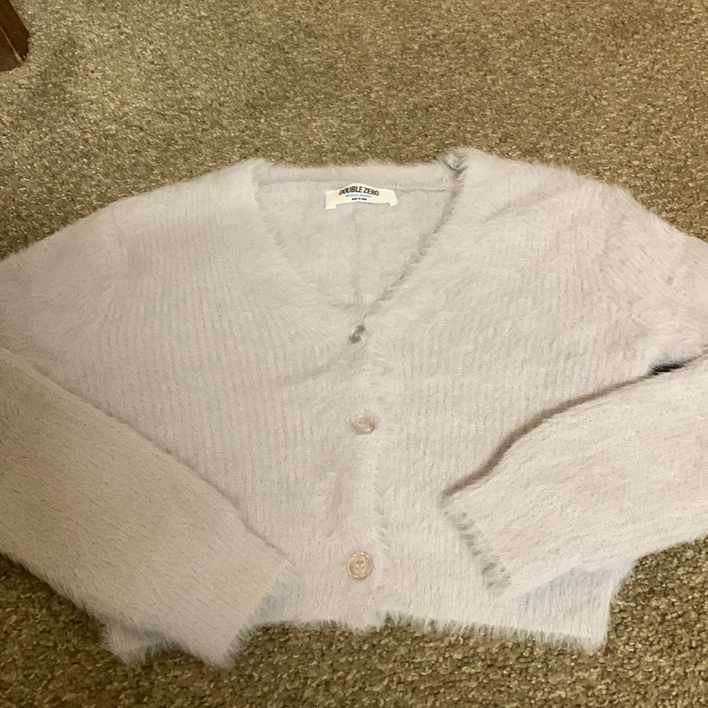 I’m selling a little gray shrug it goes very well over dresses